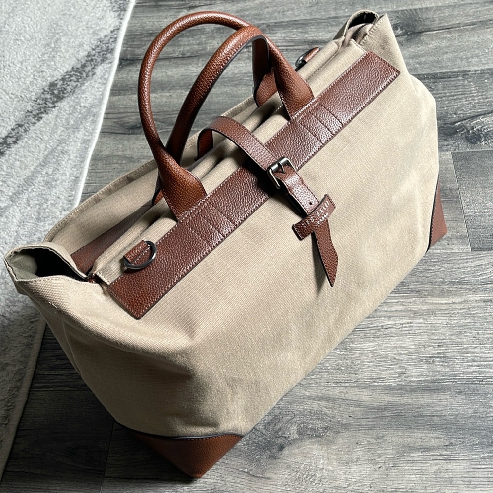 Ted baker overnight bag. Tan/brown leather and canvas. Shoulder strap incl.